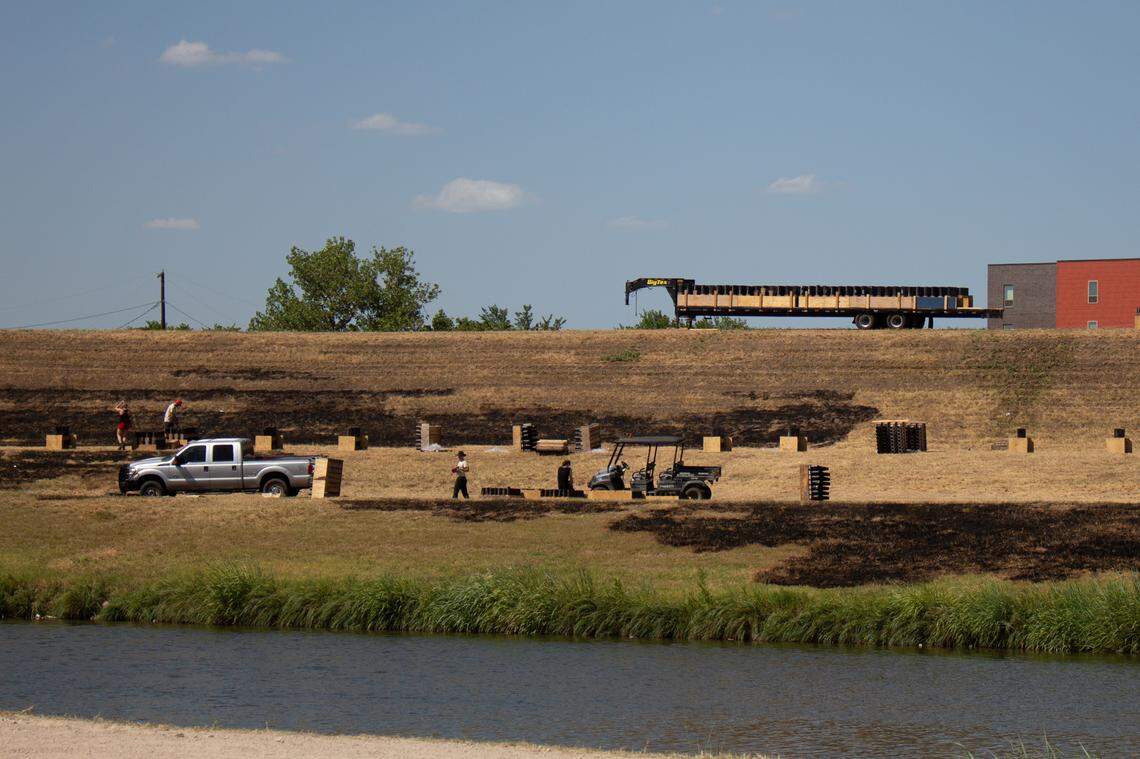 On July 4, 2023, the Fort Worth’s Fourth fireworks event at Panther Island Pavilion was stopped when several grass fires sparked minutes after the show began. Workers were cleaning up in the area on Tuesday.