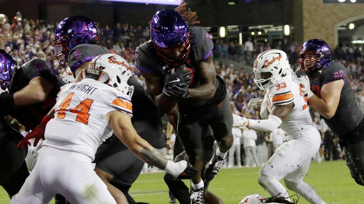 TCU’s Savion Williams scores during the first half against Oklahoma State at Amon G. Carter Stadium on Saturday November 9, 2024.