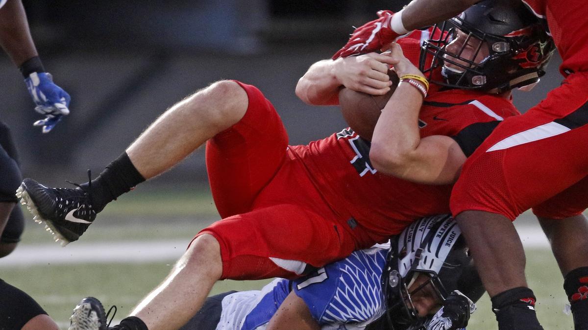 Trey Flint recovers a fumbled punt as North Forney played Colleyville Heritage in a high school football game at Dragon Stadium Friday August 31, 2018.