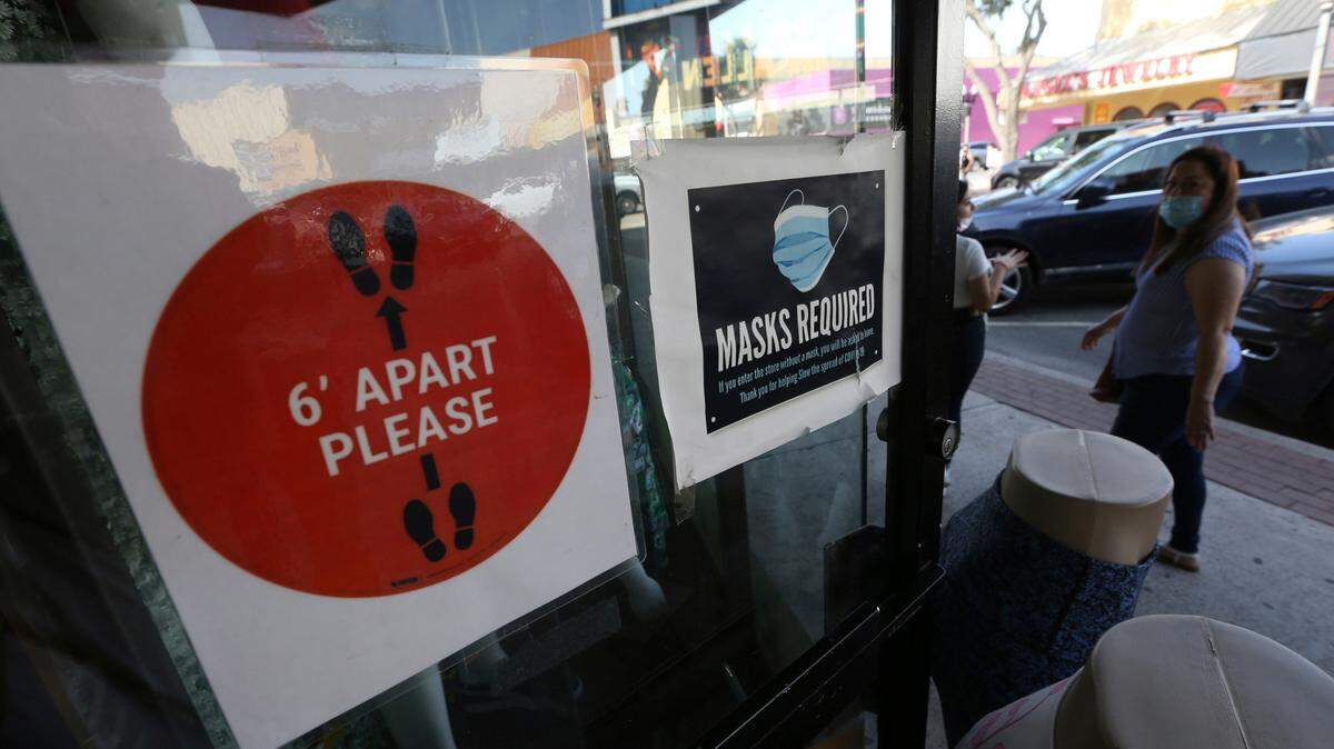 Signs in McAllen, Texas, promote safety practices amid COVID-19. (AP/Delcia Lopez)