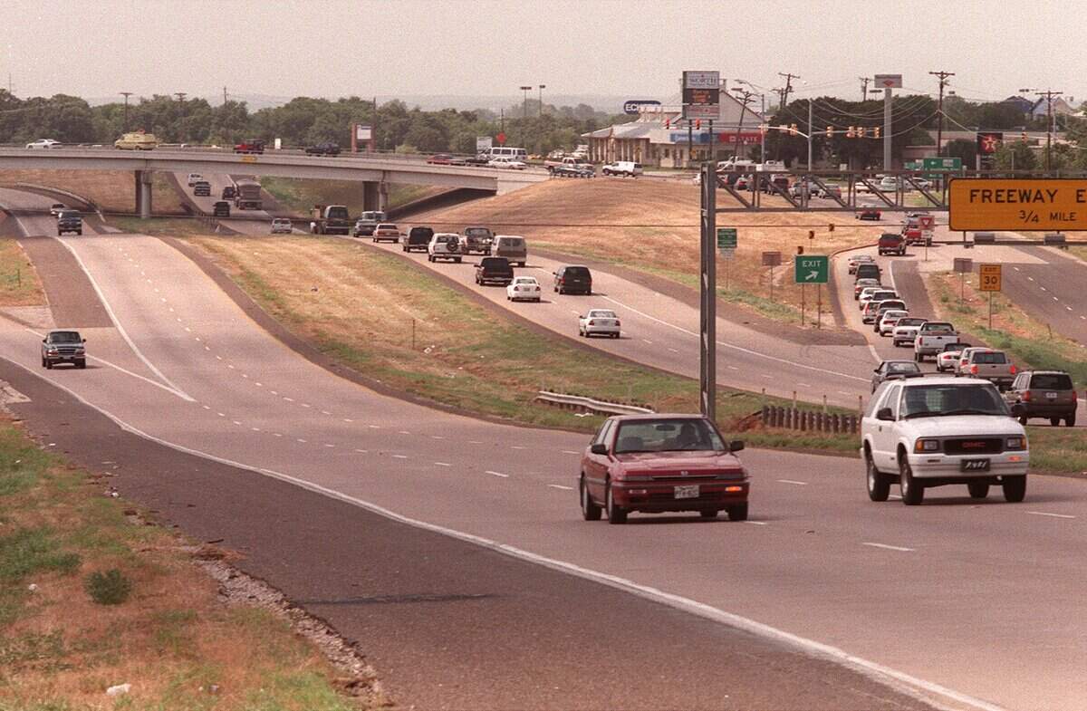 July 14, 1999: TxDOT recommends the creation of a three-lane tollway from Texas 114 in Southlake to Texas 121 at International Parkway just north of the DFW Airport. This photo is looking westward on 114. The overpass is Southlake Boulevard.