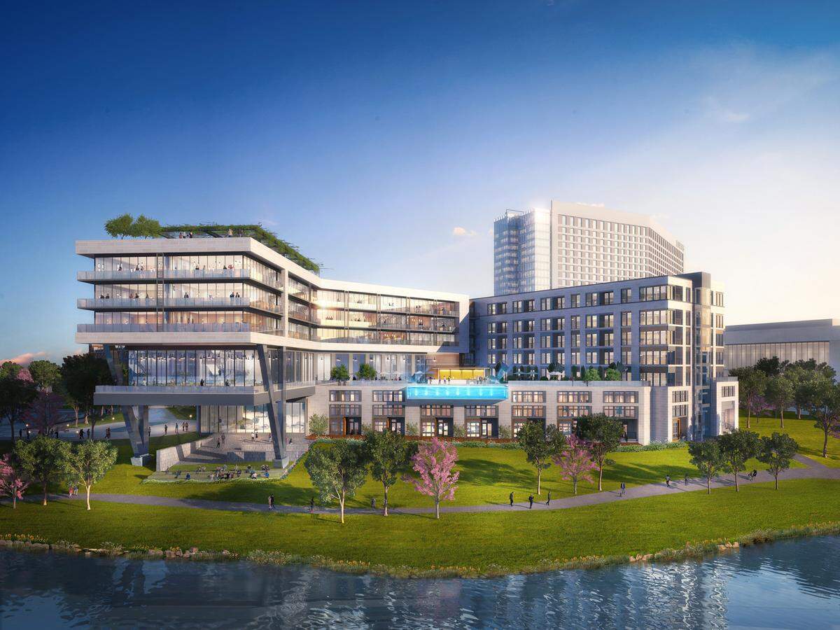 A rendering of the outside of One Rangers Way shows a creek view with adjacent walking trail.