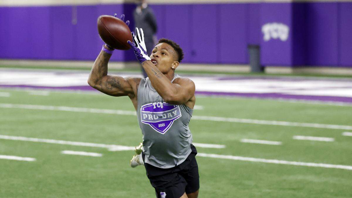 TCU safety Ar’Darius Washington goes through defensive back drills during the school’s 2021 pro day.