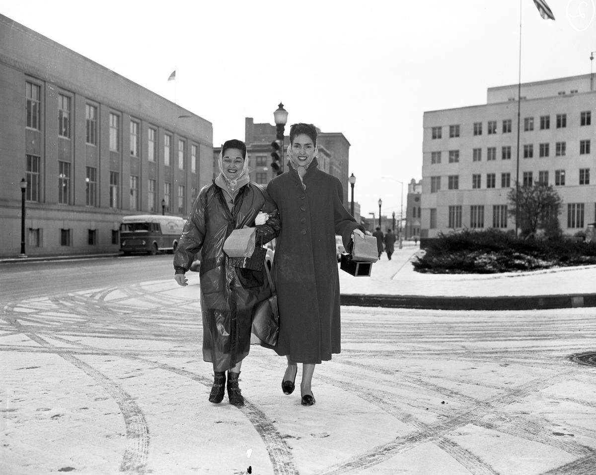 Feb. 17, 1958: “Sibyl Reynolds, left, and Mrs. Marlene Miller, Tesco employees in snow.”