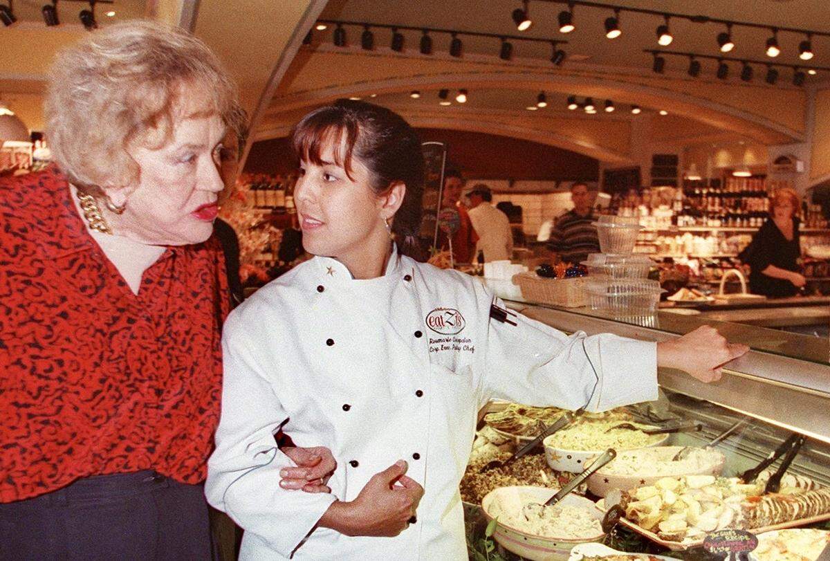 In 1999, famous chef Julia Child visited Eatzi’s Market & Bakery in Dallas for a tour with the corporate pastry chef, Rosemarie Concepcion.