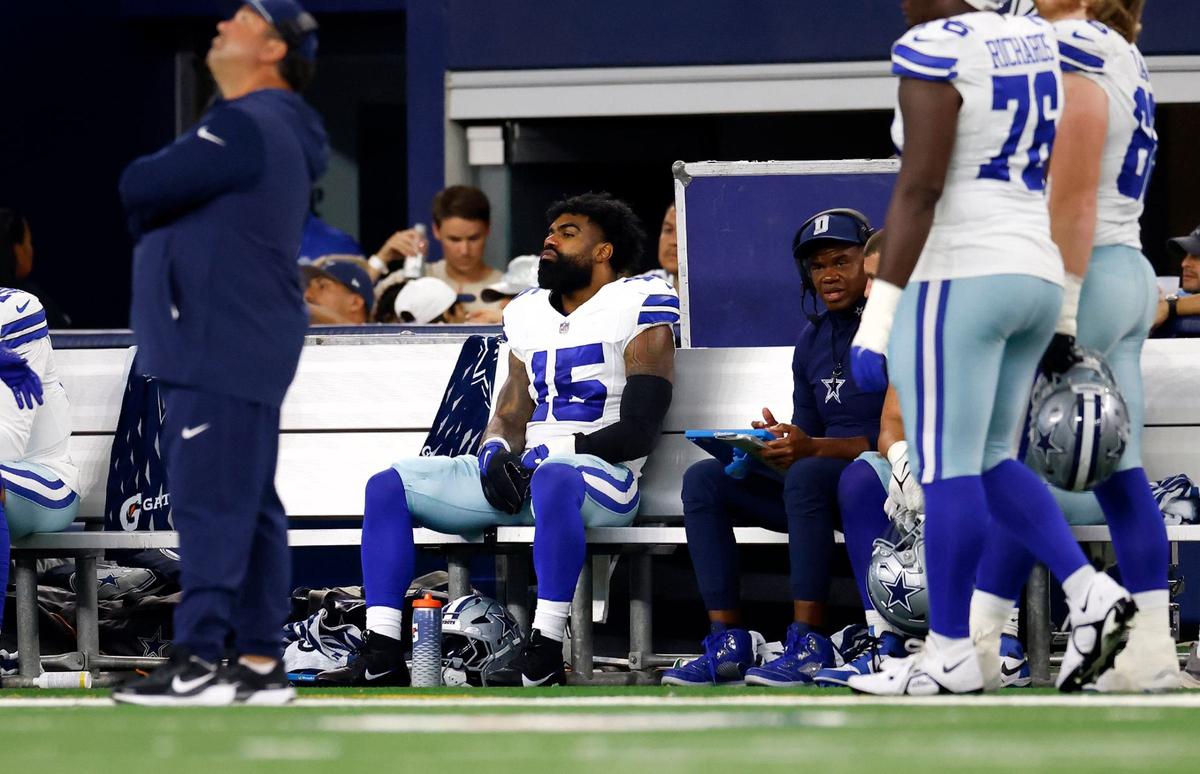 Cowboys running back Ezekiel Elliott sits on the bench during the second half against the Baltimore Ravens on Sunday in Arlington. Dallas lost to Baltimore 28-25. Zake had three carries for six yards.