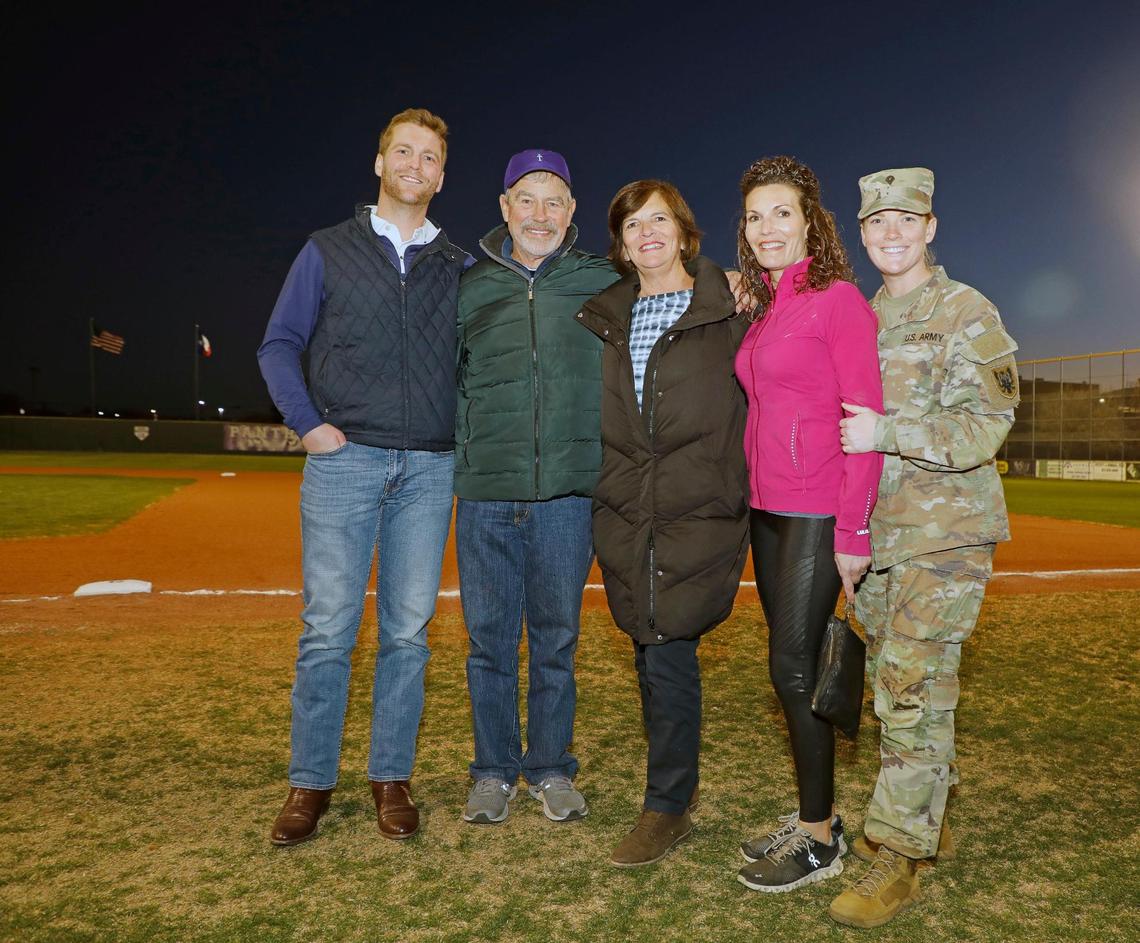 Drew Medfords’s family, including brother Michael Medford, dad David, mom Nancy and sisters Adrienne Grant and Julia Medford, poses before a game in the Drew Medford Memorial Tournament on March 12, 2022, at Paschal High School.