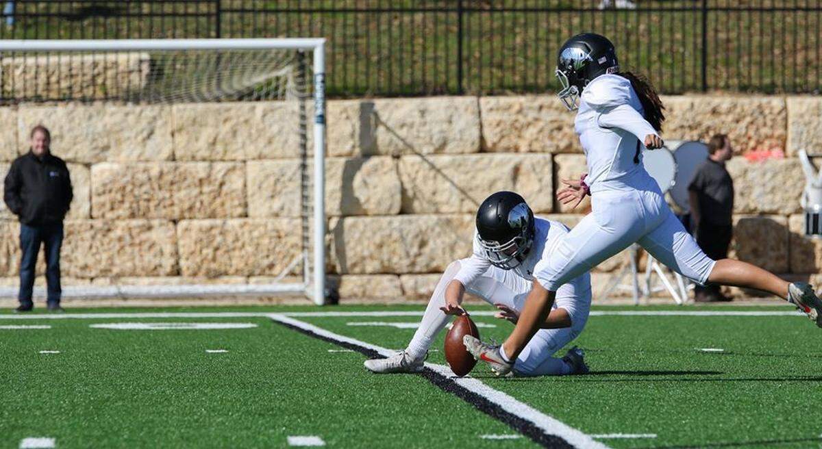 Junior Tori Soland kicks against Colleyville Covenant on Nov. 2, 2019.