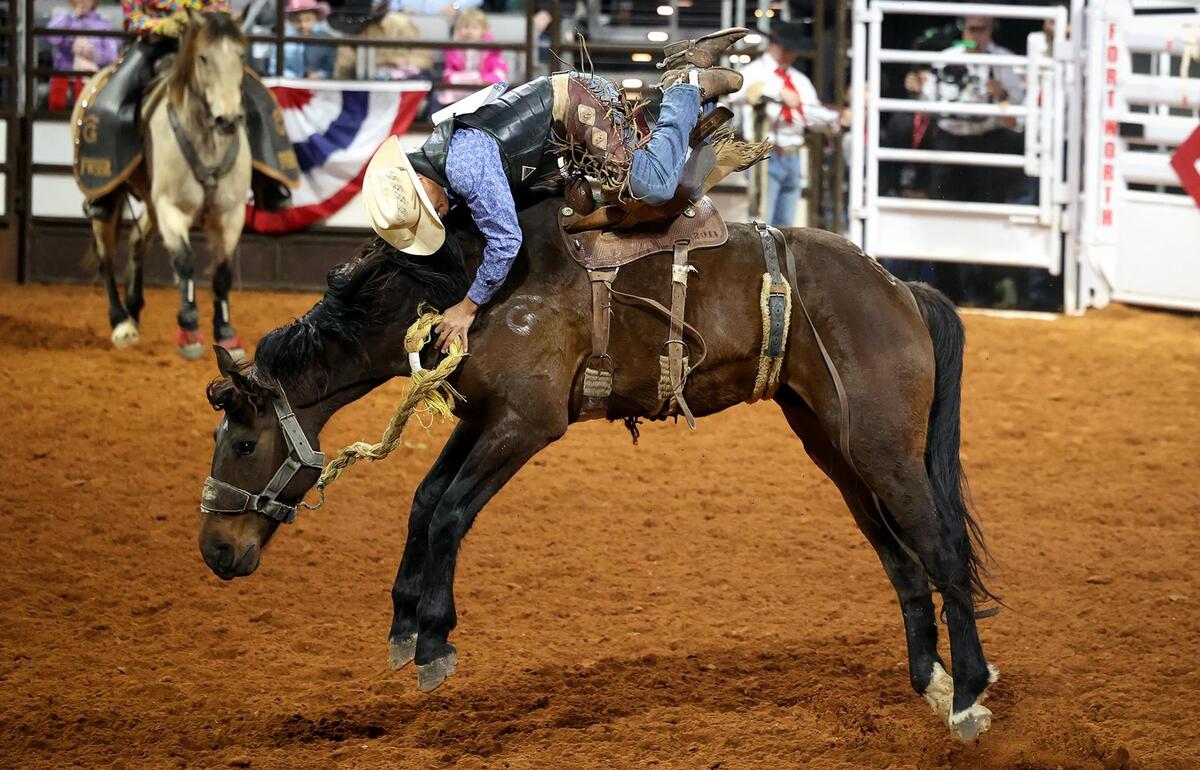 Lamar Hankins of Oklahoma City competes in the ranch bronc riding event of the Cowboys Color Rodeo on Monday, Jan. 20, 2025, at the Fort Worth Stock Show & Rodeo.