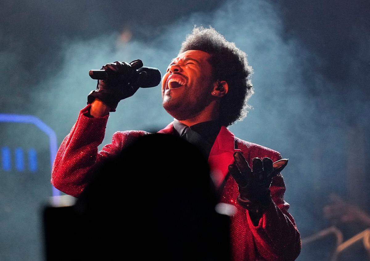 FILE - The Weeknd performs during the halftime show of the NFL Super Bowl 55 football game on Feb. 7, 2021, in Tampa, Fla. (AP Photo/David J. Phillip, File)