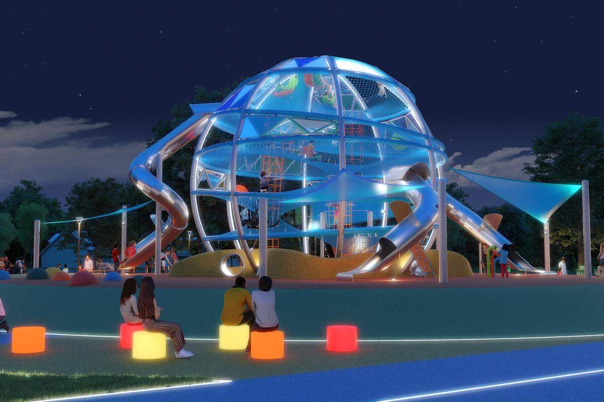A rendering of Joya park at night which has a large mesh-enclosed sphere.