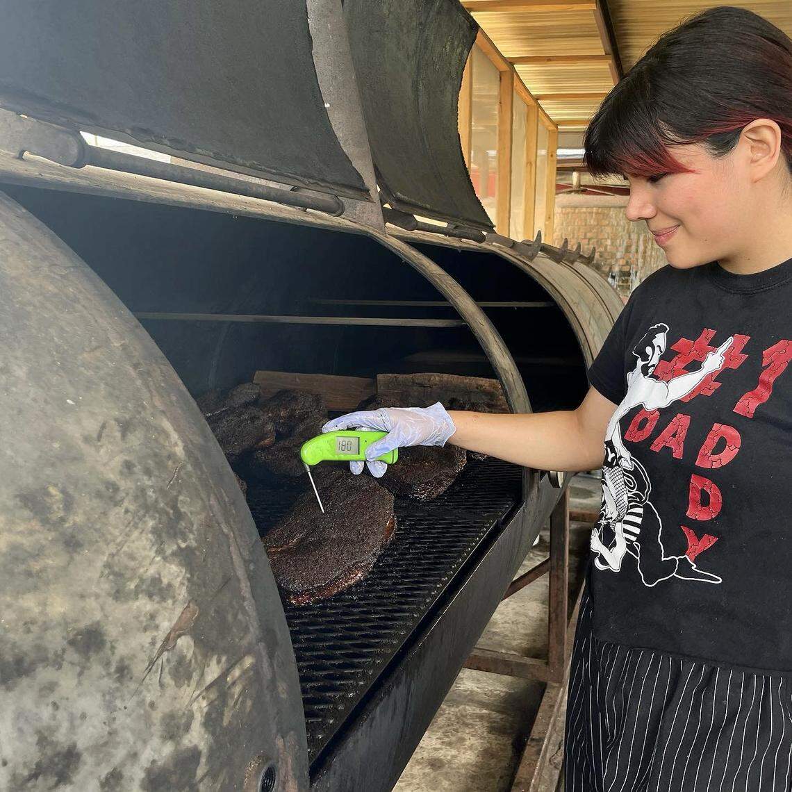 Pitmaster Chuck Charnichart in her days at Goldee’s Barbecue.