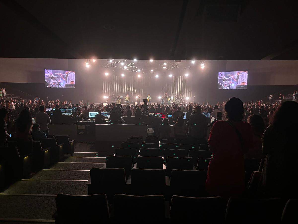 Congregants at Southlake megachurch Gateway sing during worship at Sunday service on July 28. Gateway announced two charismatic evangelical megachurch leaders will act as co-interim pastors while it searches for a replacement for Robert Morris, who resigned after he was revealed to have sexually abused a child in the 1980s.