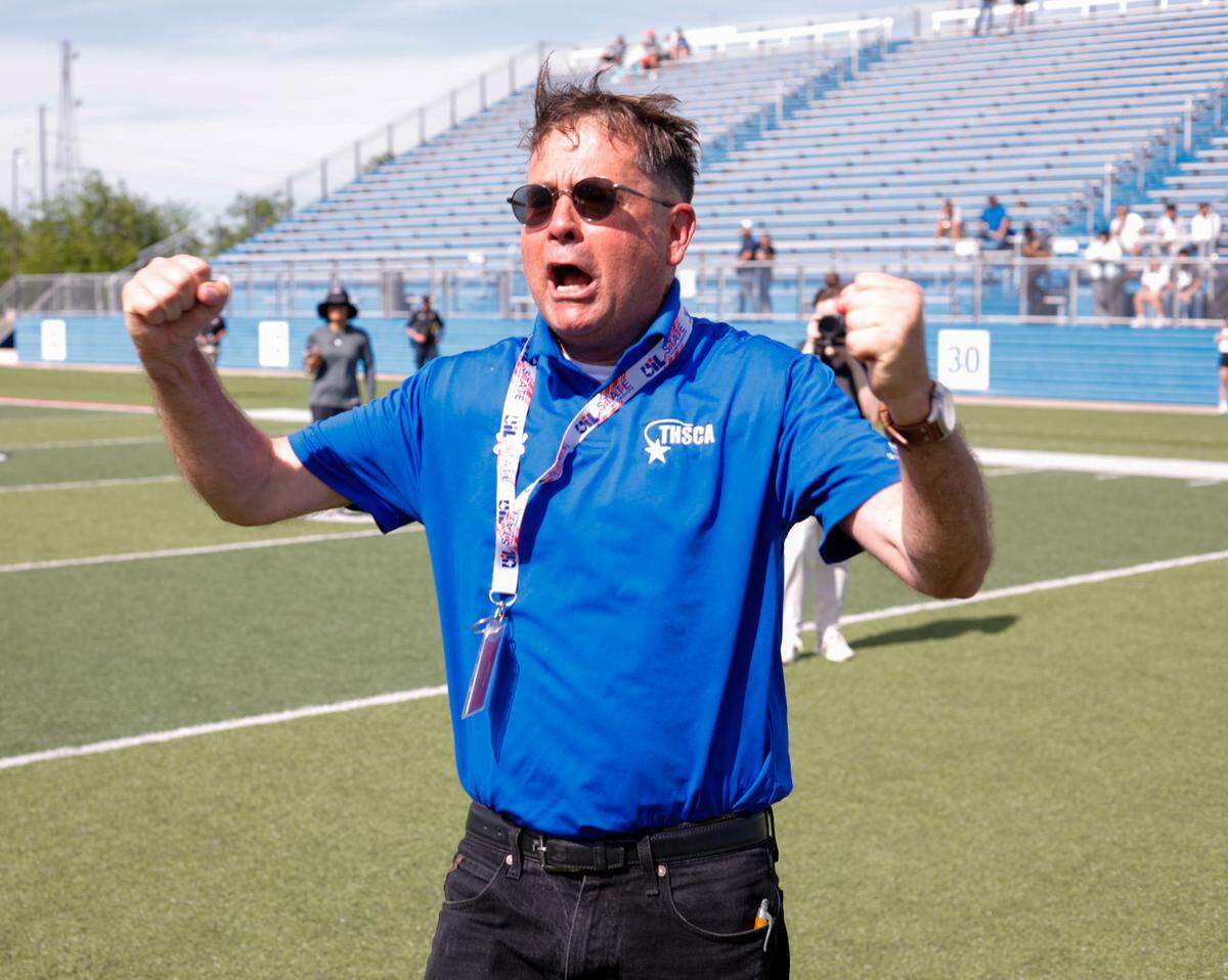 San Elizario head coach Max Sappenfield celebrates a Class 4A state title win over Boerne at Birkelbach Field in Georgetown, Texas on April 12, 2024.