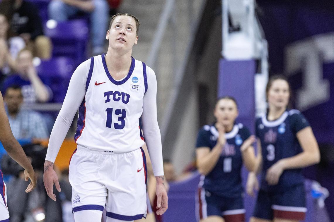 TCU center Sedona Prince (13) looks up at the replay after an offensive foul is called on her in the first half of the first round of the Women’s NCAA Championships Tournament game between TCU and Fairleigh Dickinson at Schollmaier Arena in Fort Worth on Friday, March 21, 2025.
