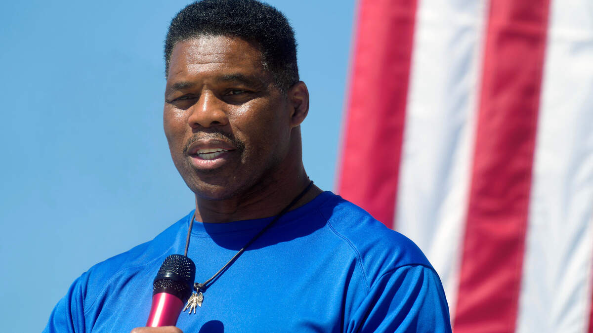 Georgia Republican Senate nominee Herschel Walker speaks during a campaign stop at Battle Lumber Company on Oct. 6, 2022, in Wadley, Ga.