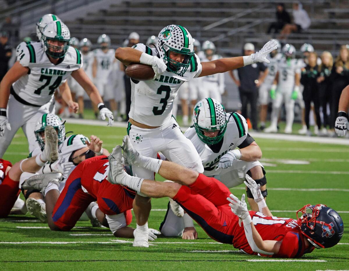Southlake running back Davis Penn (3) takes the ball through traffic during a District 4 6A football game at Northwest ISD Stadium in Justin, Texas, Thursday, Oct. 17, 2024.