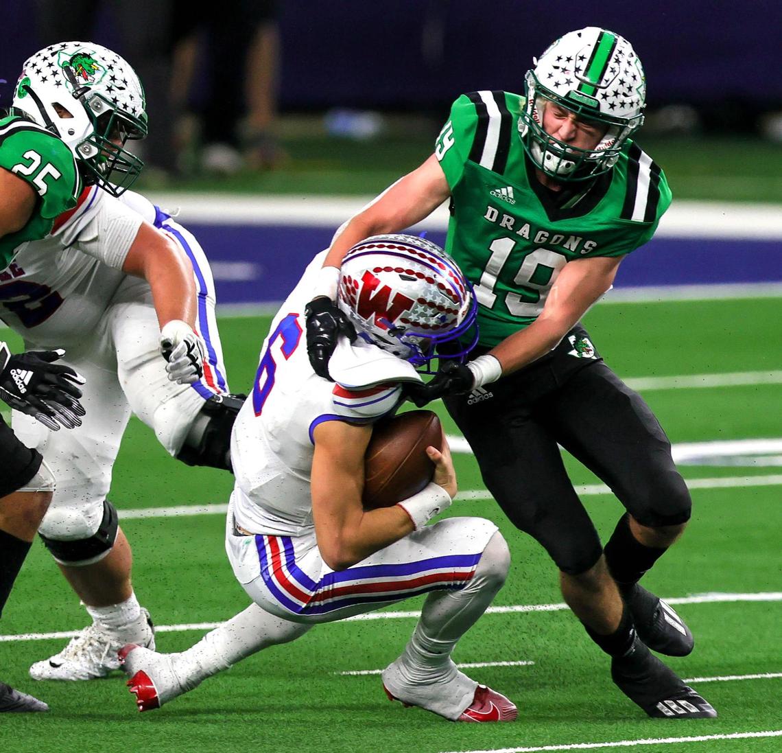 Southlake Carroll defensive back Logan Anderson (19) sacks Austin Westlake quarterback Cade Klubnik (6) during the second half of the 6A Division 1 High School State Championship football playoff game, January 16, 2021 played at AT&T Stadium in Arlington, Tx. (Steve Nurenberg Special to the Star-Telegram)