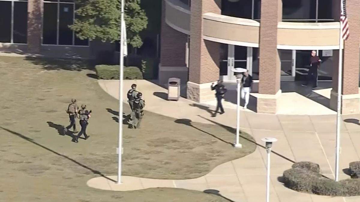 Police arrive at Timberview High School on Oct. 6, 2021, after a shooting inside a classroom.