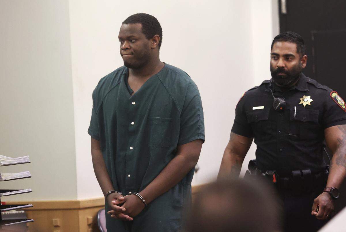 Reginald Kimbro, accused of sexually assaulting and murdering two North Texas women and raping four others, enters a Tarrant County courtroom during a hearing on Friday, March 18, 2022.
