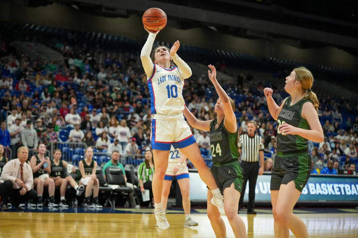 Turkey Valley’s Anna Ferrel goes up for two of her game-high 16 points as the Patriots defeated Neches 54-41 in a Class 1A state semifinal on Thursday, February 29, 2024 at the Alamodome in San Antonio, Texas.