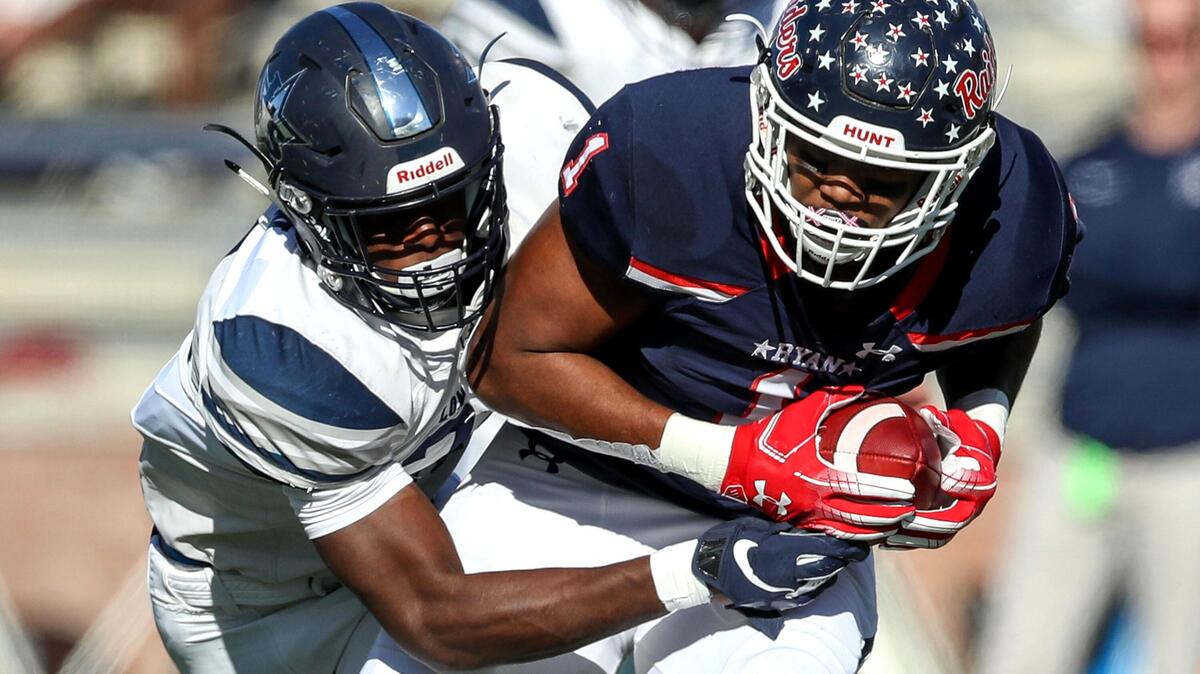 Denton Ryan wide receiver Ja’Tavion Sanders (1) comes up with a reception against Frisco Lone Star during the first half of the 5A Division I State semifinal high school football playoff game played at Eagle Stadium in Allen, TX, Saturday, December 14, 2019.