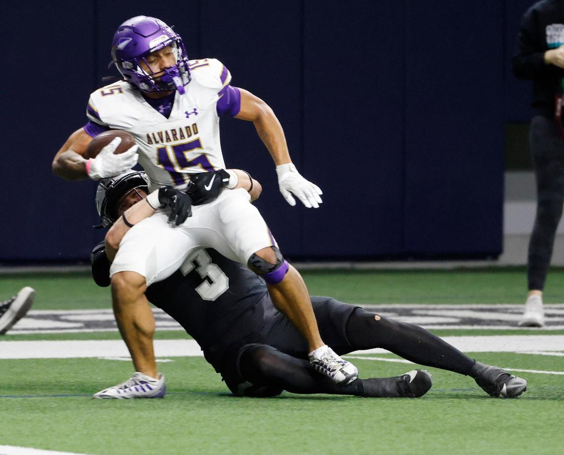 Panther Creek defensive back Seth Jackson (3) brings Alvarado wide receiver Lance Sansom (15) down just shy of the goal line during a UIL 4A D1 Area round football playoff game at The Ford Center in Frisco Texas, Thursday, Nov. 21, 2024.