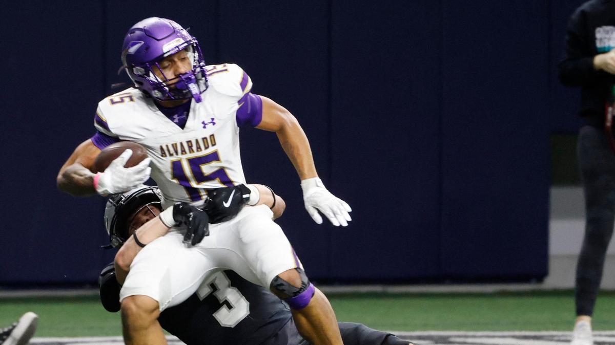 Panther Creek defensive back Seth Jackson (3) brings Alvarado wide receiver Lance Sansom (15) down just shy of the goal line during a UIL 4A D1 Area round football playoff game at The Ford Center in Frisco Texas, Thursday, Nov. 21, 2024.