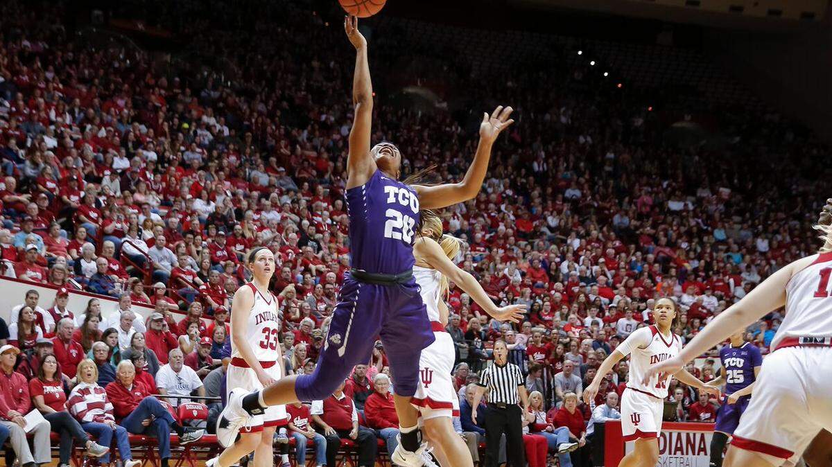 TCU guard Lauren Heard drives for a layup Wednesday night against Indiana in Bloomington, Indiana. The Horned Frogs lost 71-58 in the WNIT semifinal at Assembly Hall.
