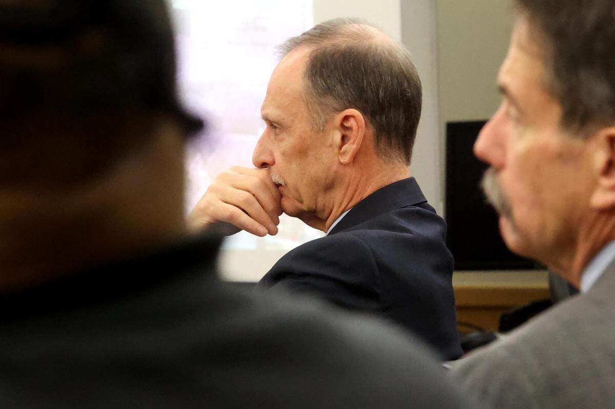 Defense attorney Bob Gill watches as defendant Aaron Dean is questioned by Assistant Tarrant County Criminal District Attorney Dale Smith on Monday, December 12, 2022, in Fort Worth. Dean, a former Fort Worth police officer, is accused of murder after fatally shooting Atatiana Jefferson in 2019 during an open structure call.
