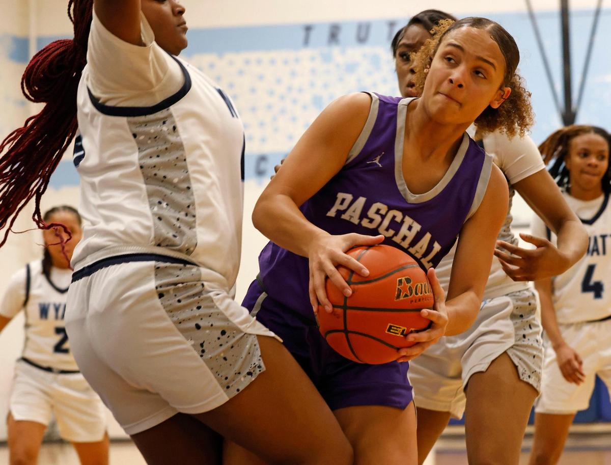 Paschal forward Victoria Hultgren (22) runs into traffic under the net during a UIL girls basketball game at O.D. Wyatt High School in Fort Worth, Texas, Friday, Jan. 24, 2025.