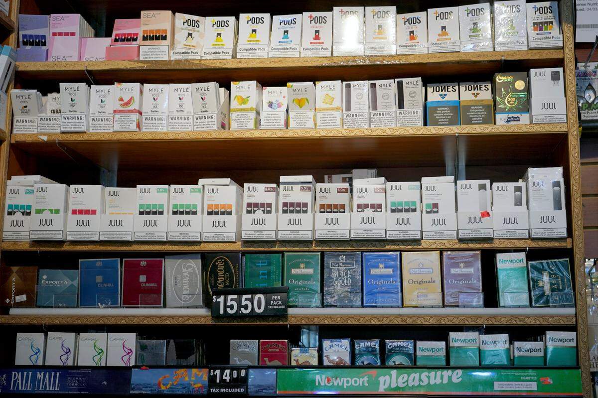 E-cigarettes for sale among tobacco products in New York, Sept. 15, 2019.