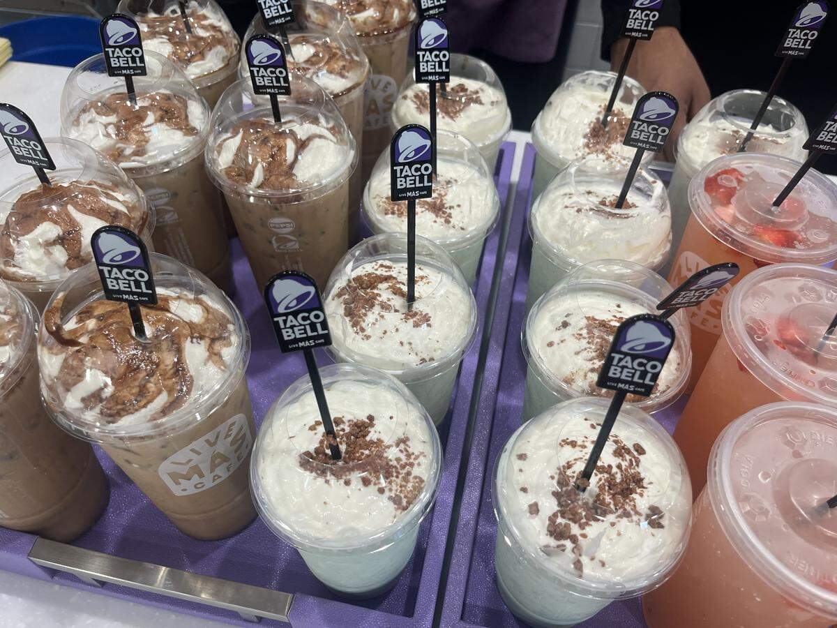 The Mexican Mocha Iced Coffee (left), Baja Blast Pie Chiller (middle) and Strawberry Passionfruit Limonada Refresca (right) were drinks at the grand opening of Taco Bell Live Más Cafe at 5506 E. Mockingbird Lane in Dallas on Thursday, Nov. 6, 2025.
