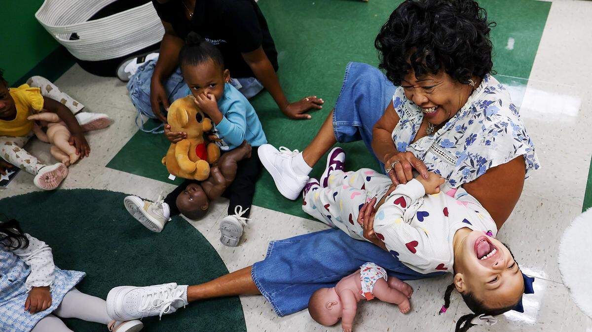 Wanda Fields, 75, interacts with children at the Early Head Start program at J.A. Hargrave Elementary School on Monday, Sept. 15, 2025, in Fort Worth. Fields spends 20 hours a week volunteering through the Texas Health and Human Services' Foster Grandparent program.