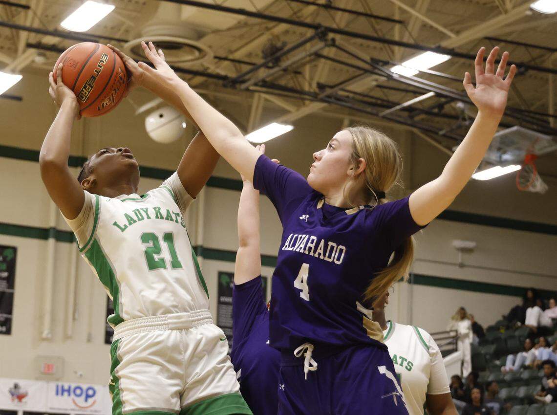 Alvarado shooting guard Cylee Morton (4) blocks the shot of Kennedale forward Kiahna Young (21) during the first half of a UIL basketball game between Alvarado and Kennedale at Kennedale High School in Kennedale, Texas, Tuesday Jan. 13, 2026