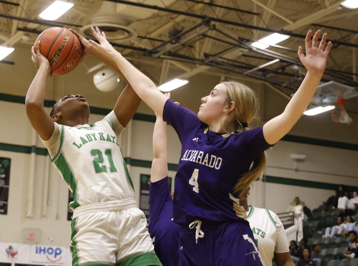 Alvarado shooting guard Cylee Morton (4) blocks the shot of Kennedale forward Kiahna Young (21) during the first half of a UIL basketball game between Alvarado and Kennedale at Kennedale High School in Kennedale, Texas, Tuesday Jan. 13, 2026