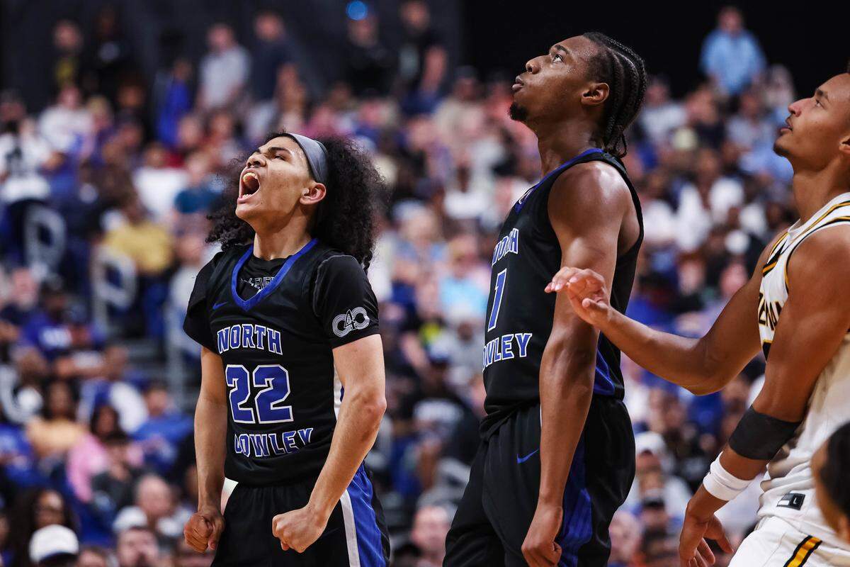 North Crowley guard Isaak Hayes (22) screams in celebation with his teammate Alex Barther II (1) after an and-one in the Class 6A Division I state championship against San Antonio Brennan at The Alamodome in San Antonio, Texas, March 14, 2026.