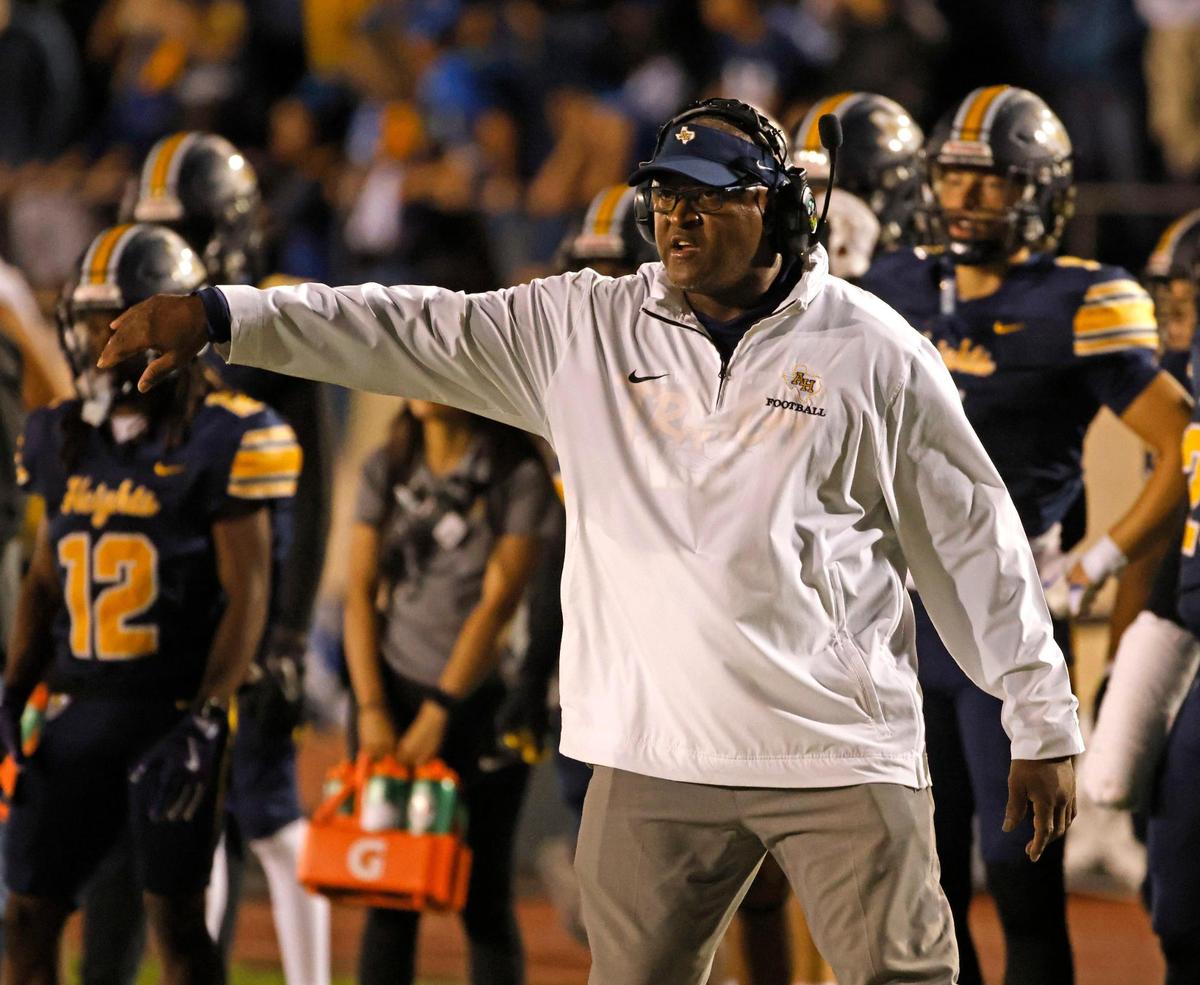Arlington Heights head coach Curtis James gestures to the team during the Battle of the Bonfire UIL District 4-5A D1 football game at Farrington Field in Fort Worth, Texas, Friday, Nov. 08, 2024.