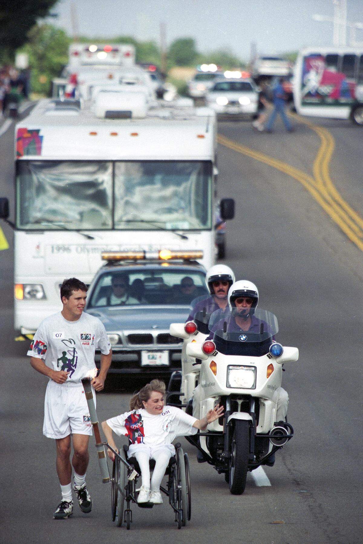 Amy Baxter, Ms. Wheelchair America, participating in the 1996 Olympic Torch Relay in Fort Worth, Texas.