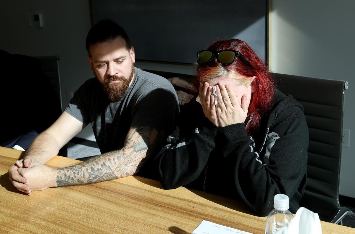 Chase, left, and Jessi Safro react while describing the changes in their daughter in the final months she attended ABA Interactive during an interview on Thursday, Dec. 13, 2024.