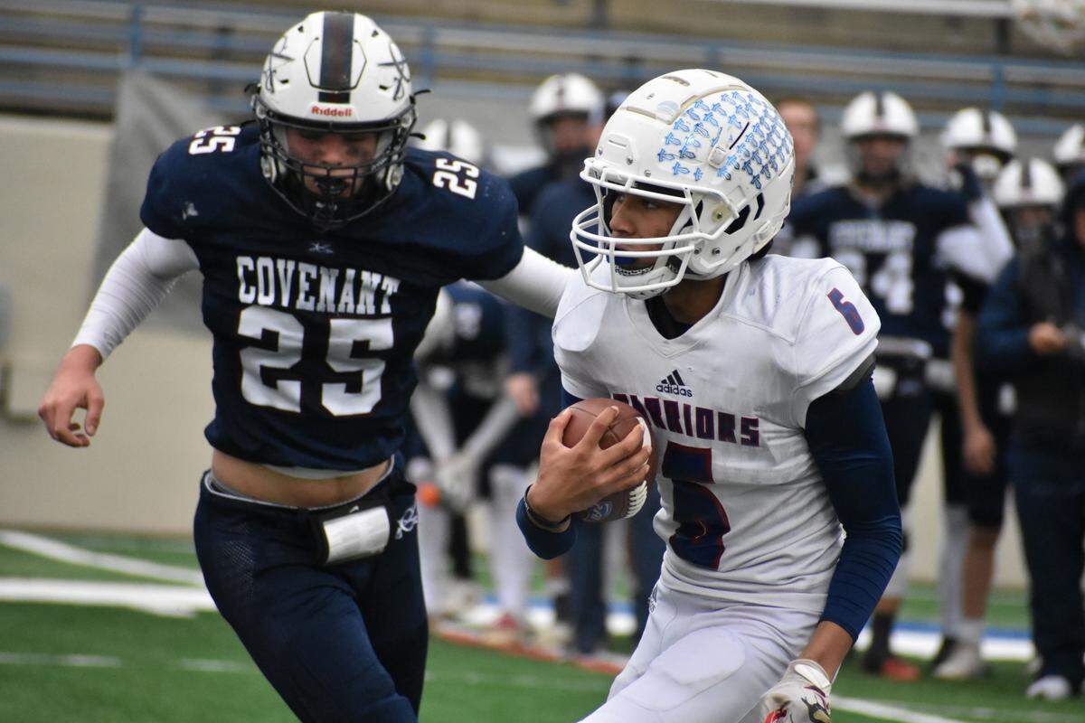Covenant Classical defensive lineman Luke Evans (25) closes in on Pasadena First Baptist running back Donald Guillory (6) in the first half of the TAPPS Division II 6 Man championship game. The Cavaliers defeated First Baptist 68-30 on Thursday, December 1, 2022 at Waco ISD Stadium. Courtesy Antony Blalock/txhsfb.net