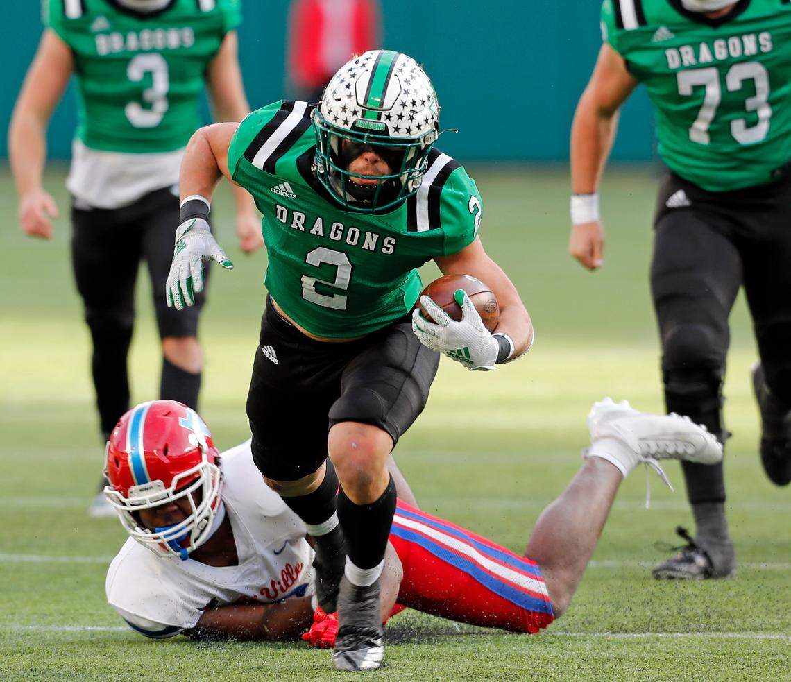 Southlake running back Owen Allen runs the ball upfield during the Conference 6A Division 1 2020 state championship semi-final football game at Globe Life Park in Arlington, Texas, Saturday, Jan. 09, 2021. Duncanville led 27-21 at the half. (Special to the Star-Telegram Bob Booth)