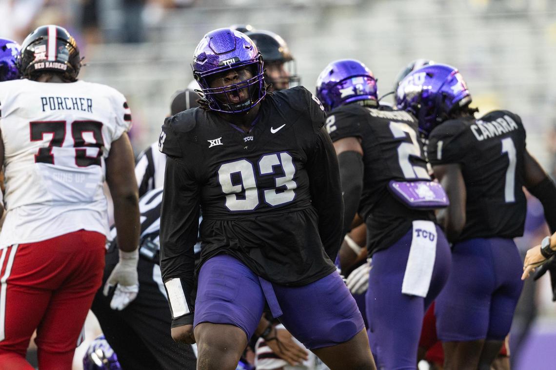 TCU defensive lineman Hakeem Ajijoolaiya (93) celebrates after his team forced a fumble late in the second half to secure a win against Texas Tech at Amon G. Carter Stadium in Fort Worth on Saturday, Oct. 26, 2024. TCU won 35-34.