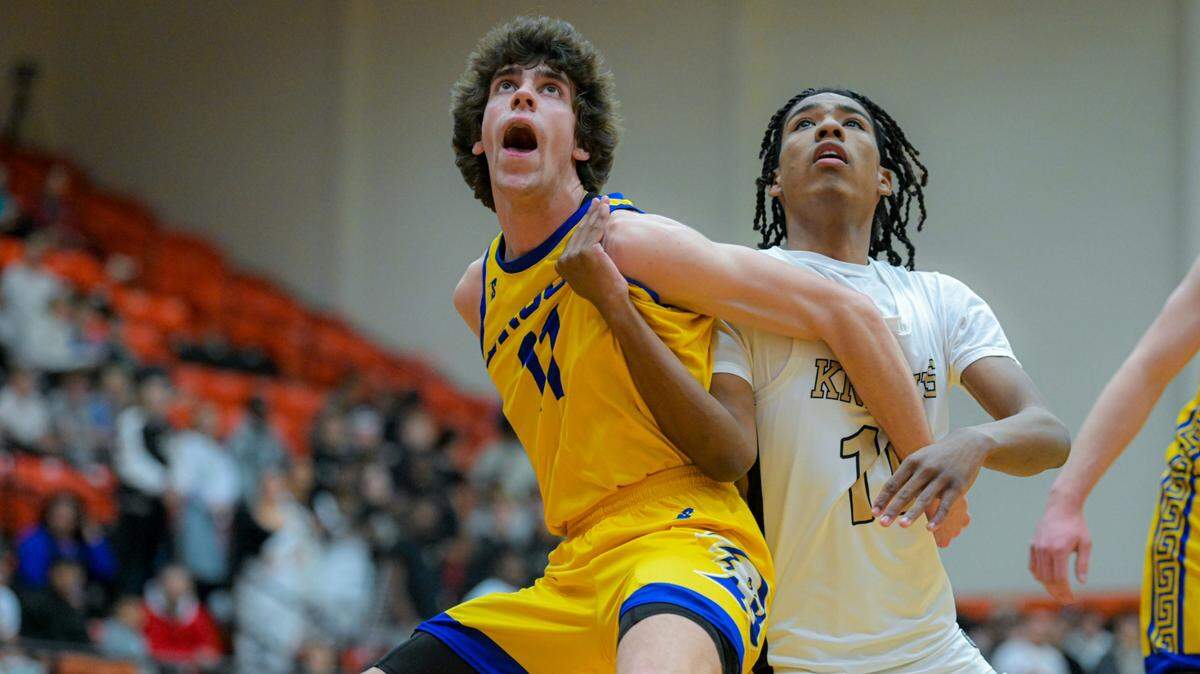 Brock’s Braden Pitchford (11), left, and Fort Worth Eagle Mountain’s Klain Ogamba (10), right, battle for position in a Class 4A Division 2 area-round boys basketball game on Thursday, February 20, 2025 at Aledo High School in Aledo, Texas. Brock defeated Eagle Mountain 57-42.
