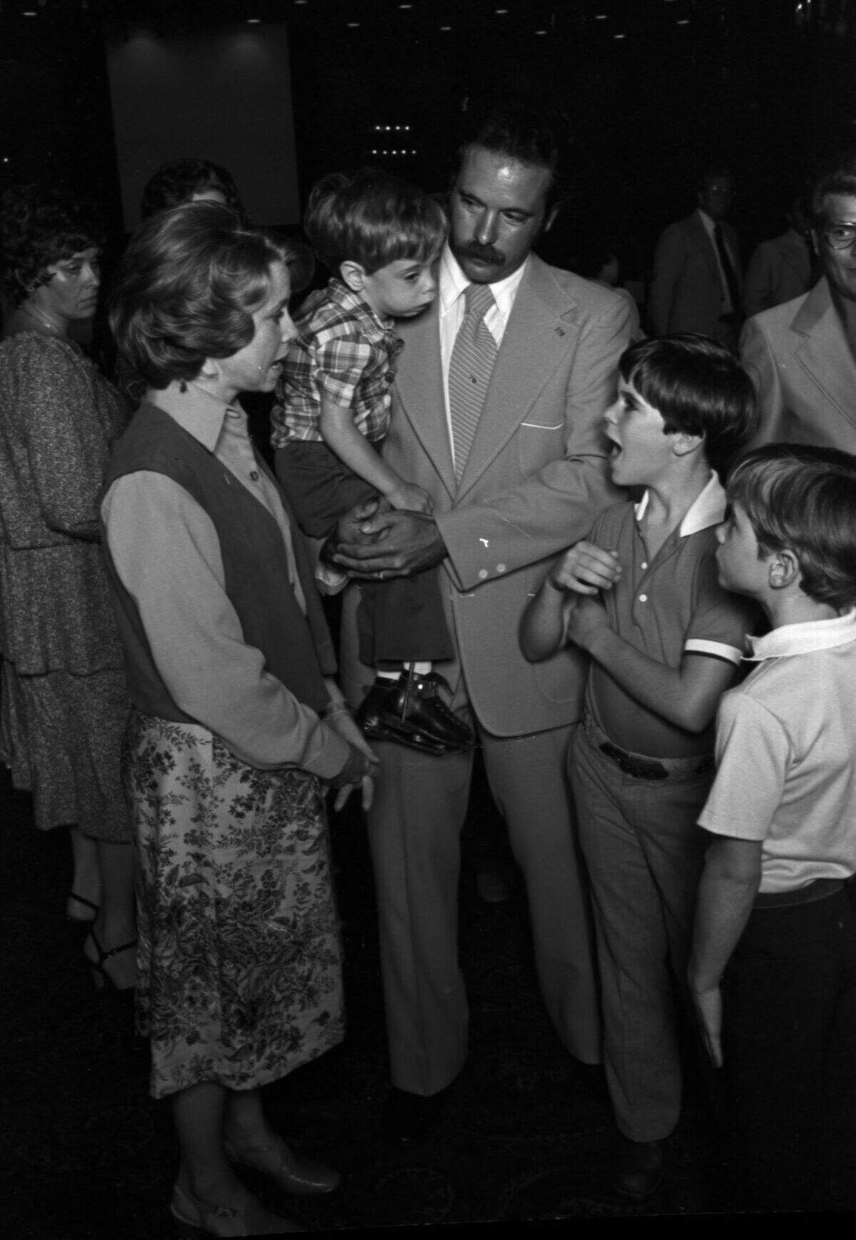 Sept. 5, 1978: Colby Moss, center, 4-year-old campaign poster child with cerebral palsy, attends the 1978 Jerry Lewis Muscular Dystrophy Telethon with his family. Colby can be seen in his father’s arms, his mother is next to him and his two siblings are standing and looking at him.