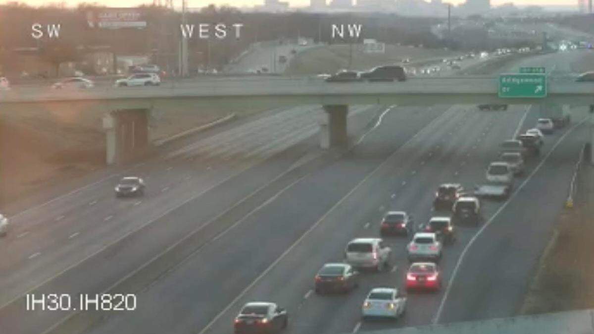 One person died in a multi-vehicle crash that shut down all westbound lanes of Interstate 30 in Fort Worth on Sunday, police said.