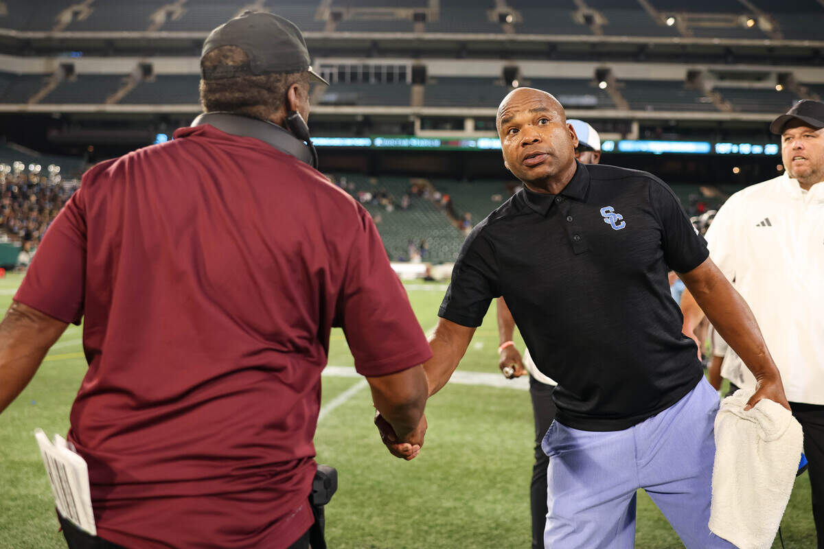 Arlington Seguin head coach Joe Gordon shakes a hand of the Red Oak head coach after Arlington Seguin beat Red Oak 41-34 in a non-district game at Choctaw Stadium in Arlington, Texas on Sept. 4, 2025.