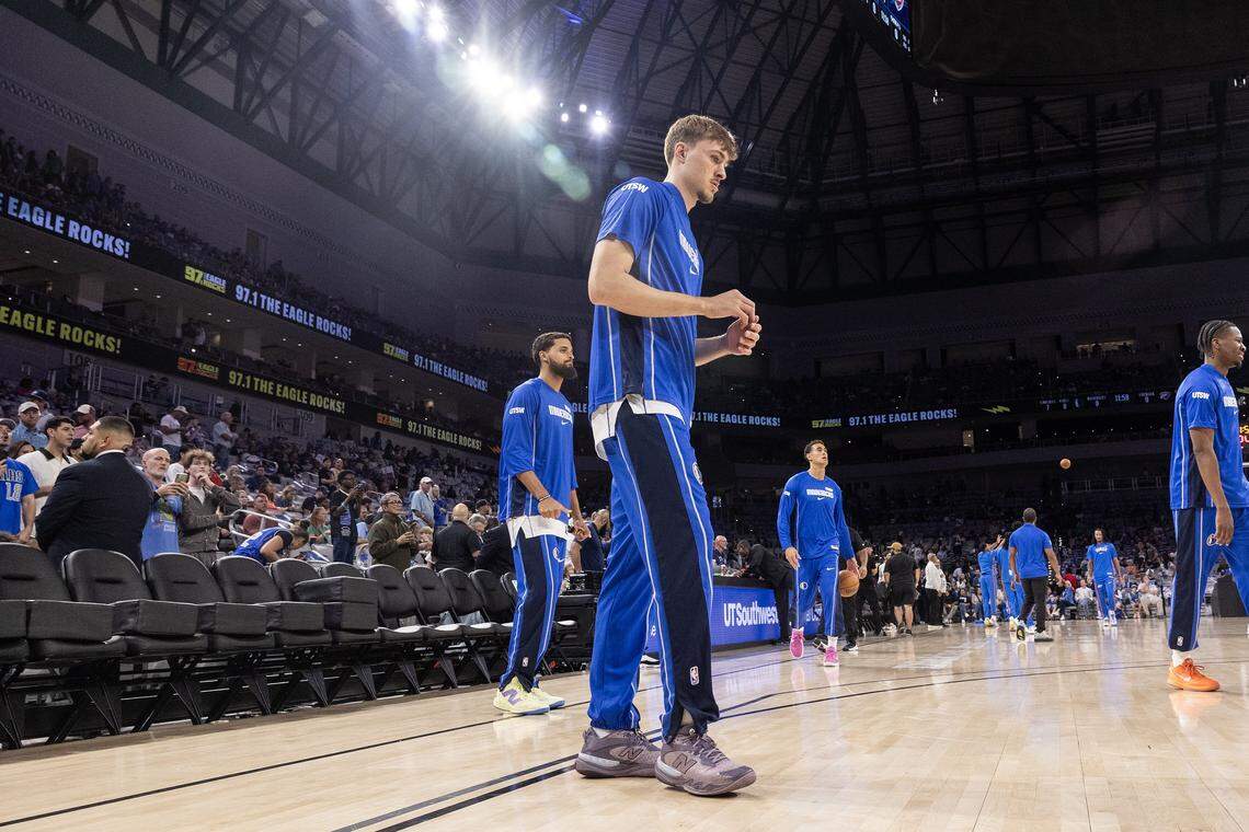 Mavericks forward Cooper Flagg warms up prior to the first half of a preseason NBA game between the Dallas Mavericks and Oklahoma City Thunder at Dickies Arena in Fort Worth on Monday, Oct. 6, 2025.