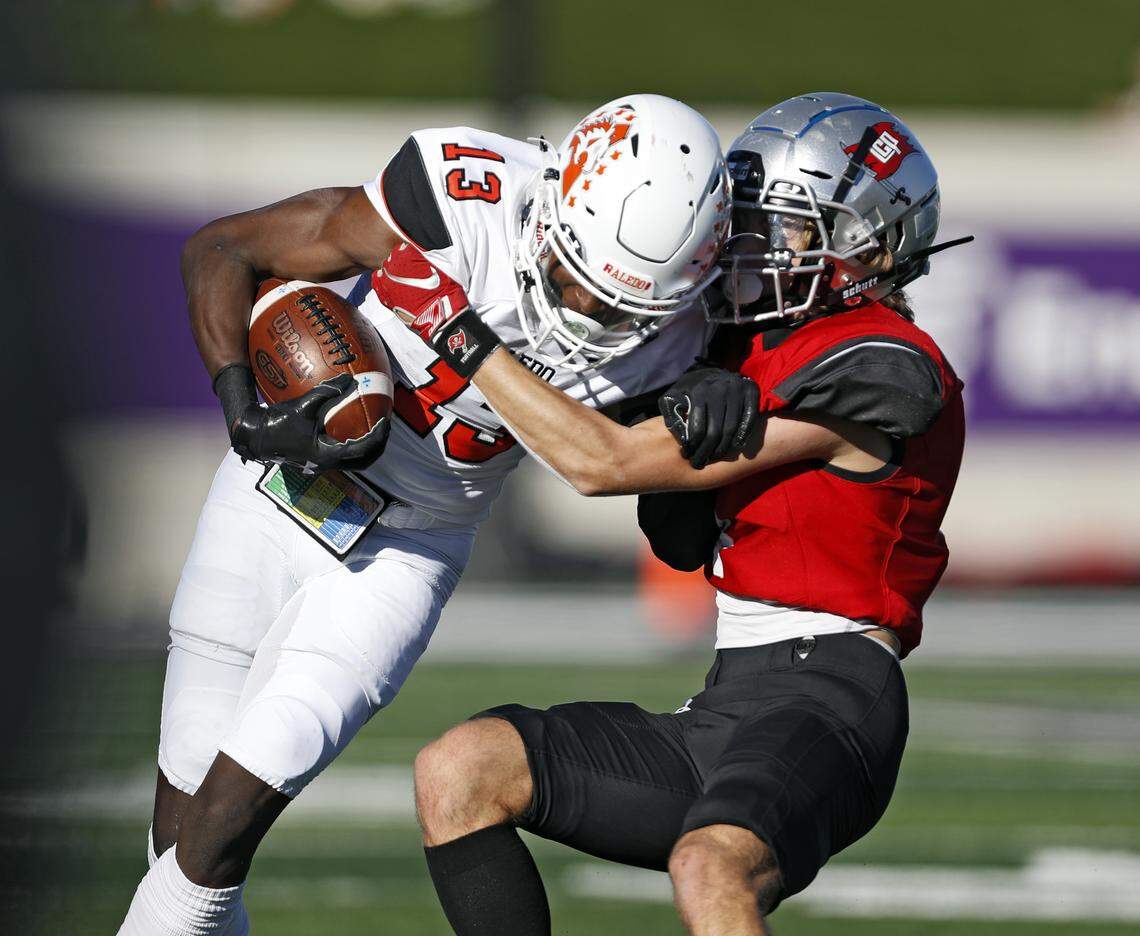 Lubbock-Cooper’s Rylan Wilcox (4) tackles Aledo’s Monterren Parks (13) during the 5A Division II state semifinal game against Aledo, Saturday, Dec. 14, 2019, at Wildcat Stadium in Abilene, Texas. [Brad Tollefson/A-J Media]