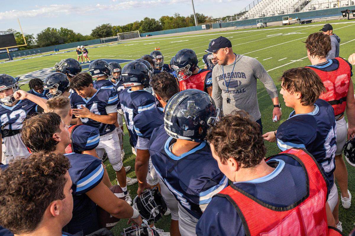 Liberty Christian Football Head Coach Jason Witten talks to the team following football practice at Warrior Stadium at Liberty Christian School in Argyle, Texas on Tuesday, Aug. 15, 2023.
